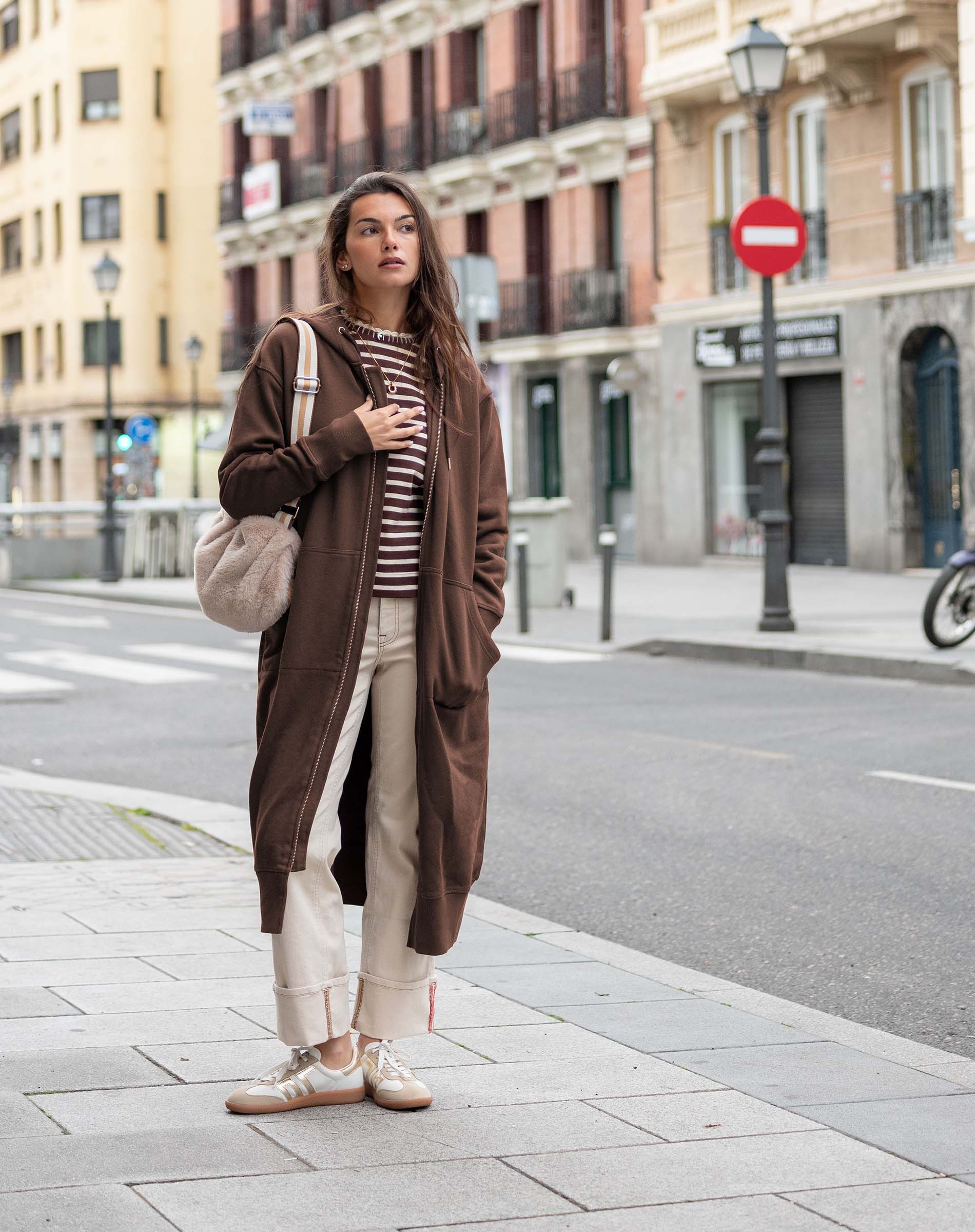 Espresso brown maxi hoodie with a front zipper and cozy knit texture.