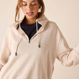 Bone quarter-zip sweatshirt with a hood and drawstring ties.