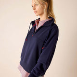 Cadet blue quarter-zip sweatshirt with a striped collar detail.
