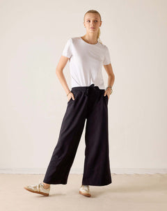 MERSEA women's travel-friendly black wide-leg trousers with an elasticated waist.
