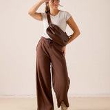 MERSEA women's travel-friendly espresso wide-leg trousers in a soft, flowing fabric with an elastic waistband.