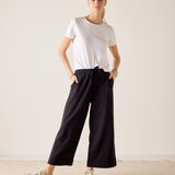 MERSEA ladies' travel-ready black Frenchie wide-leg pants with a high waist and cropped hem.