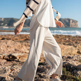 Bone wide-leg pants with a high waist and relaxed fit.