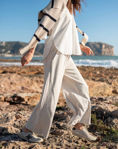 Bone wide-leg pants with a high waist and relaxed fit.