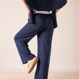 Cadet blue wide-leg pants in a woven fabric featuring a relaxed fit and functional back pockets.