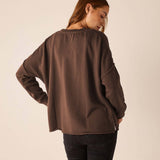 MERSEA women's travel-friendly back view of women's travel-friendly espresso zip side crewneck top.