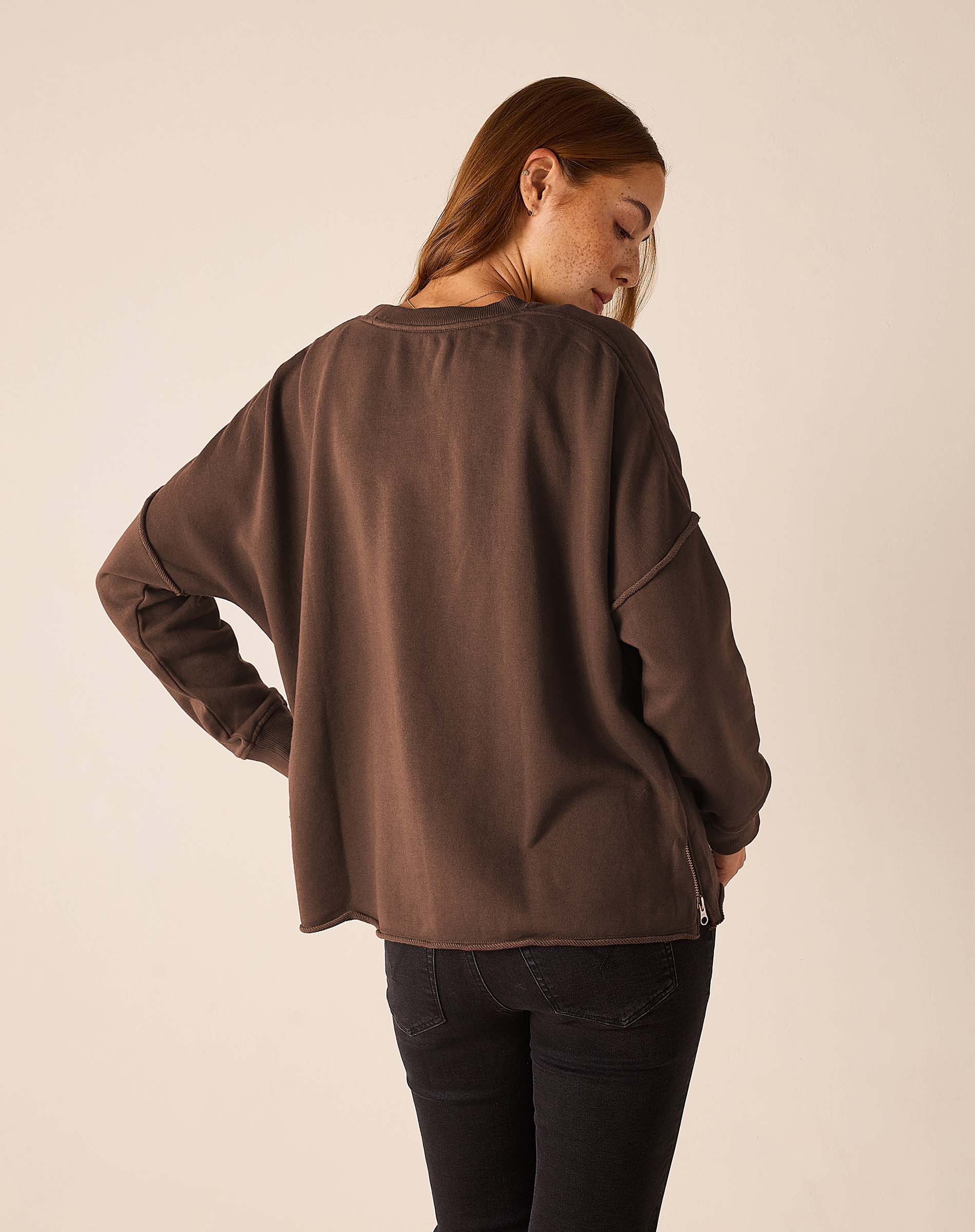 MERSEA women's travel-friendly back view of women's travel-friendly espresso zip side crewneck top.