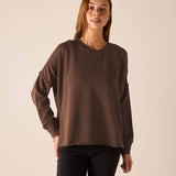Espresso brown crewneck knit top with long sleeves and a relaxed fit