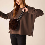 Espresso brown knit crewneck pullover with a zipper side pocket.