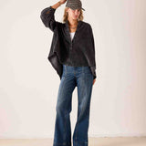 Noir oversized button-down linen-blend shirt with a relaxed fit and voluminous sleeves.