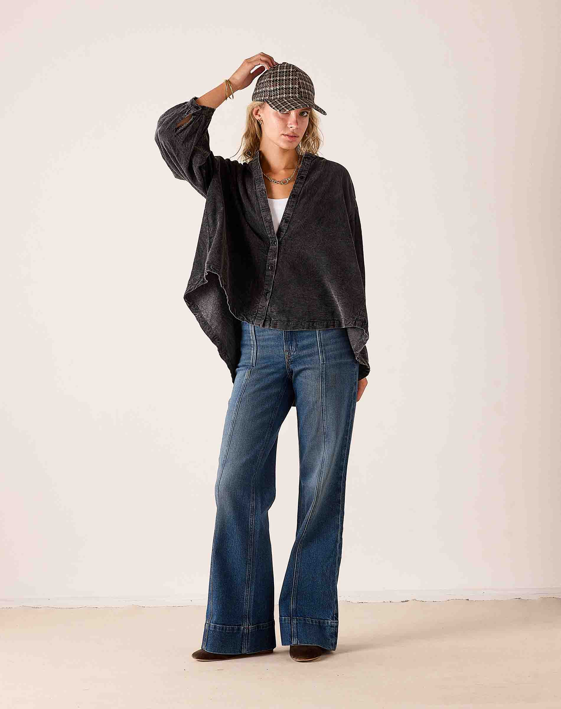 Noir oversized button-down linen-blend shirt with a relaxed fit and voluminous sleeves.
