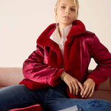 Garnet satin finish reversible jacket with plush faux fur collar.