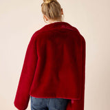 Back view of a garnet red faux fur jacket with a wide collar.
