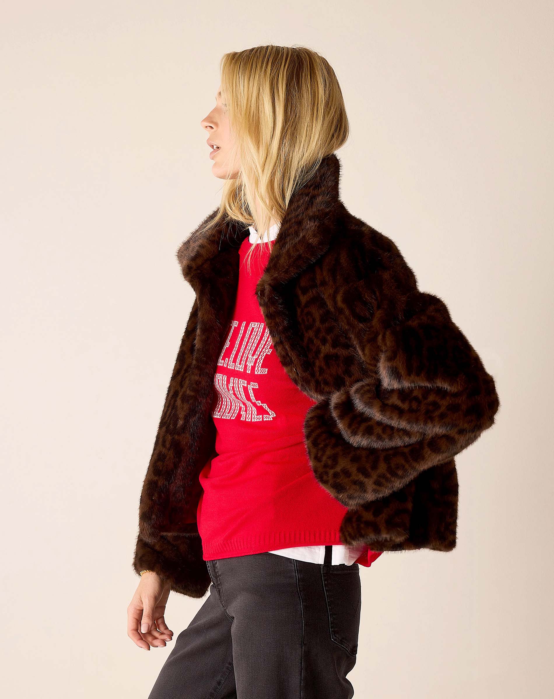 Leopard print faux fur jacket in brown and tan tones.