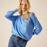 Cobalt blue knit cashmere sweater with a relaxed fit and ribbed cuffs.
