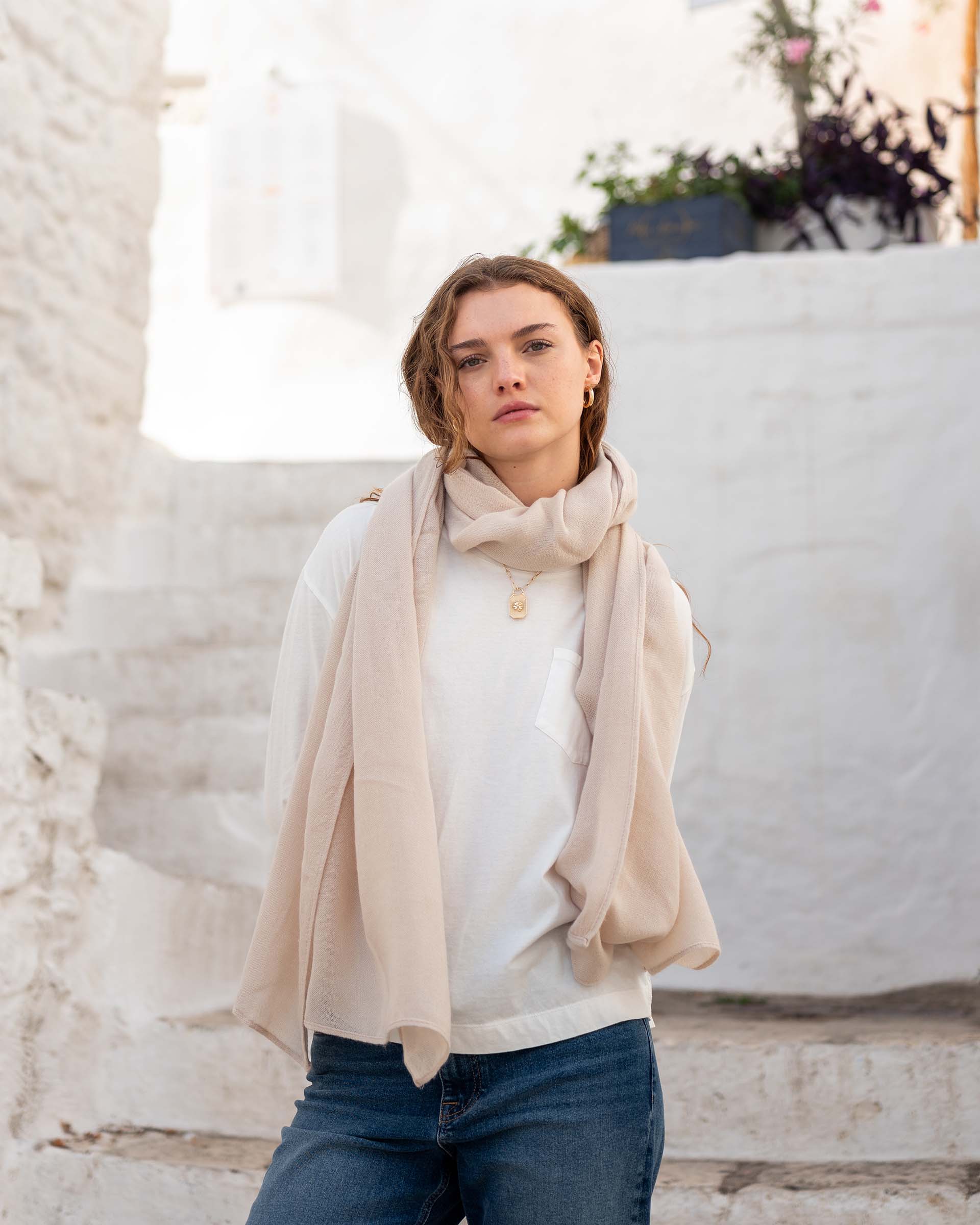 woman wearing golightly scarf around neck in moonstone