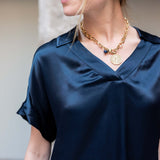 Navy boxy top in satin finish.