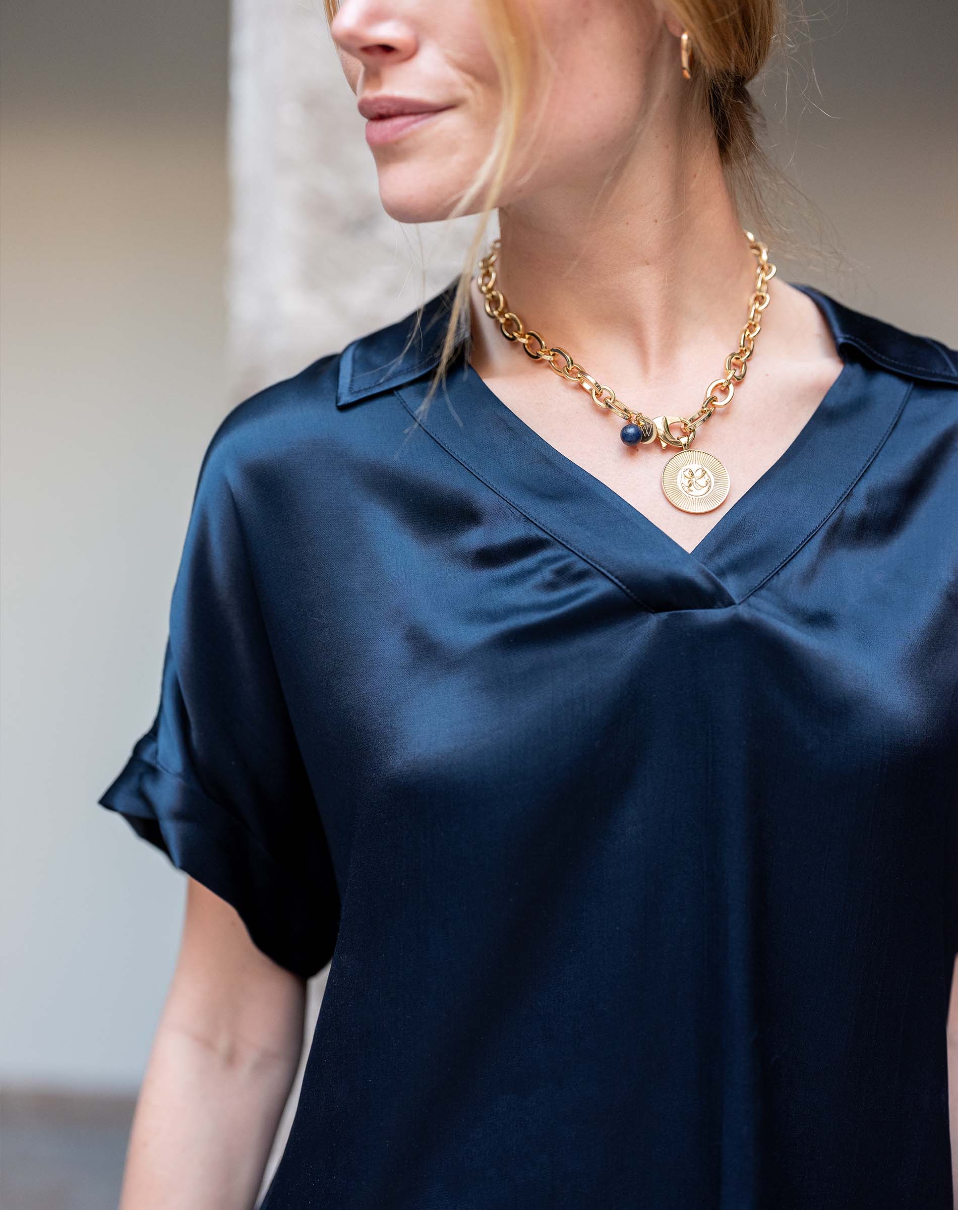 Navy boxy top in satin finish.