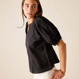 Black relaxed fit cotton blend tunic top with puff sleeves and stitch detail.