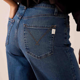Baltic blue denim wide-leg jeans featuring a unique stitched heart and 'M' monogram detail on the back pocket.