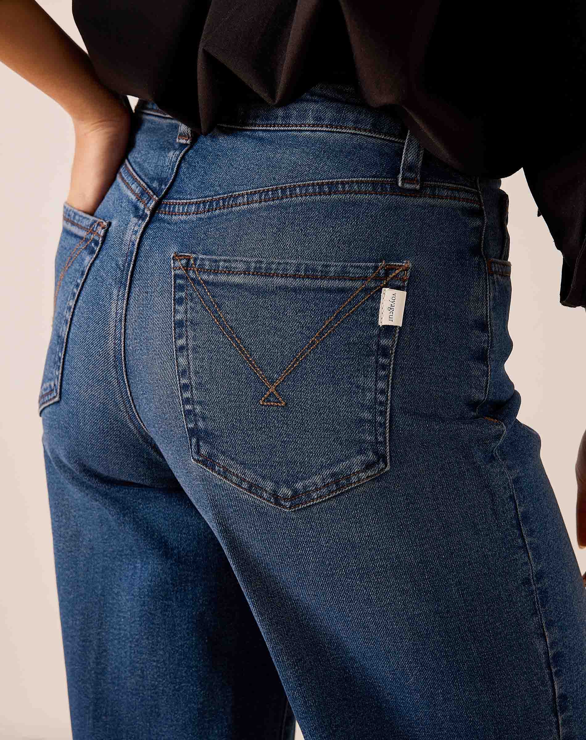Baltic blue denim wide-leg jeans featuring a unique stitched heart and 'M' monogram detail on the back pocket.