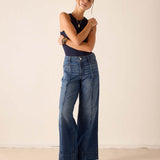 MERSEA women's travel-friendly deep pacific blue wide-leg denim pants with a raw hem and button fly.