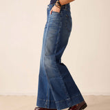 Deep pacific blue wide-leg jeans with stitched hem detail.