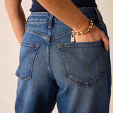Deep pacific blue wide-leg jeans with gold-tone stitching and a metallic chain detail on the back pocket