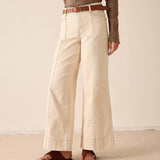 Oat wide-leg pants in a cotton blend featuring anded hem detail.