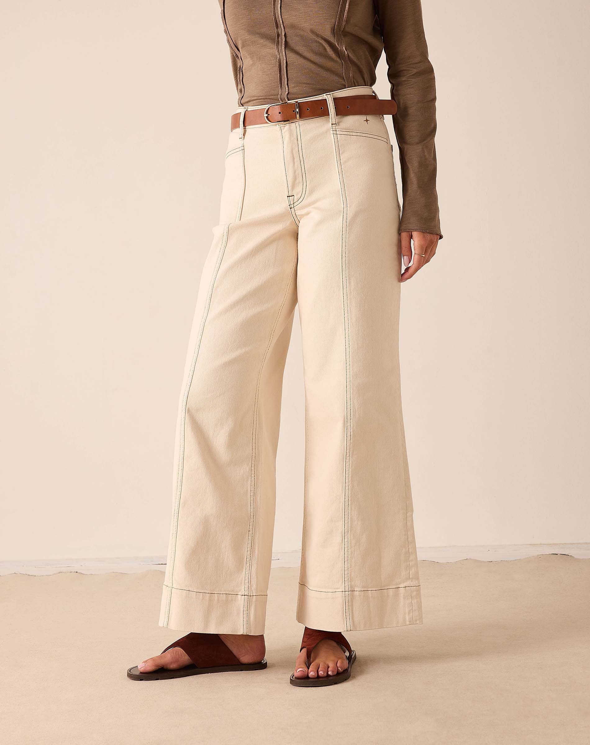 Oat wide-leg pants in a cotton blend featuring anded hem detail.