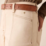 Oat-colored wide-leg trousers with a leather belt and unique stitching detail