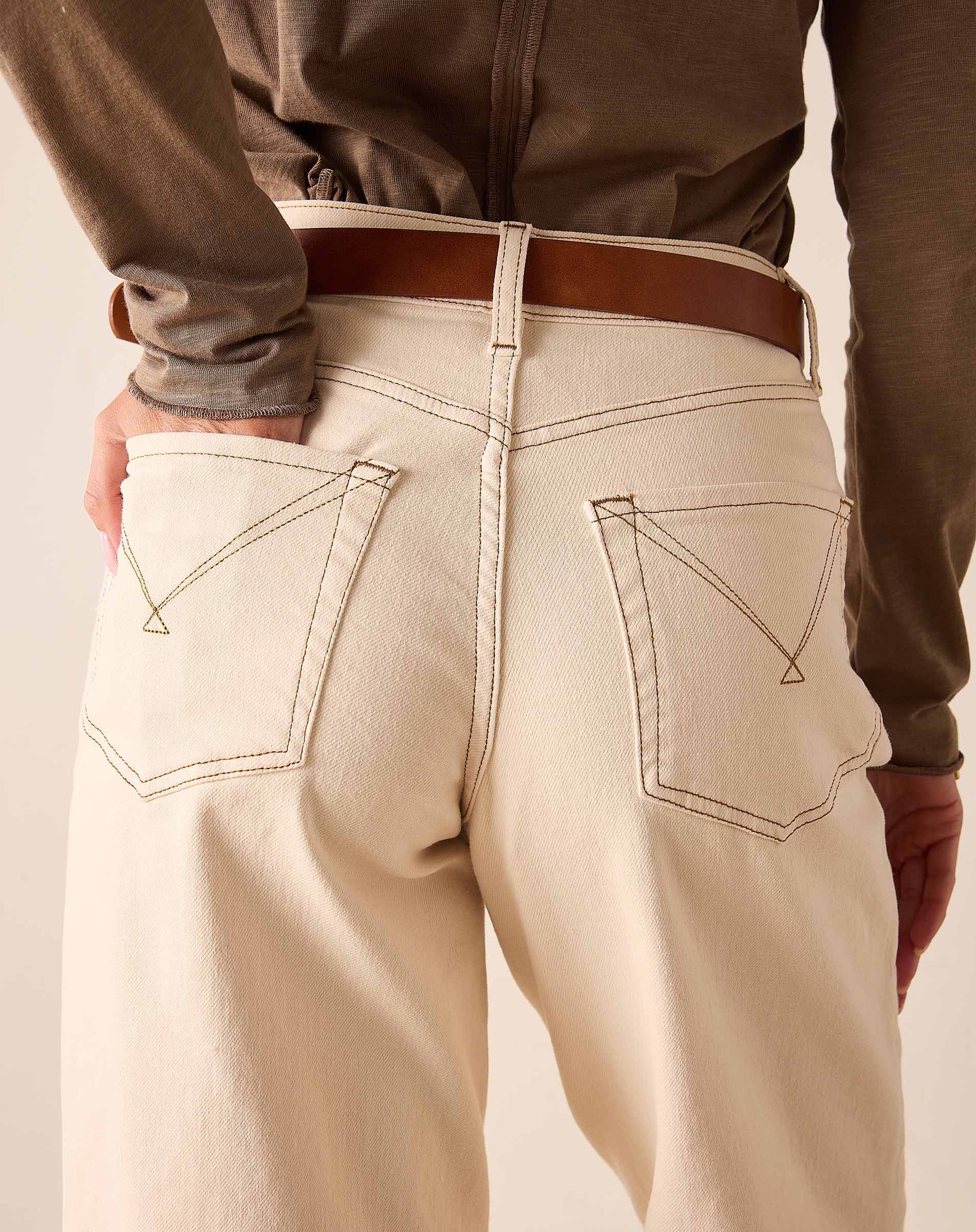 Oat color wide-leg pants in a heavy cotton twill with visible topstitching and back pockets.