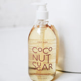 large coconut sugar liquid hand soap sitting on white counter