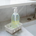 summer day hand soap sitting by sink