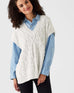 woman wearing Mersea lisbon sea salt lattice sweater