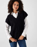 closeup of woman wearing Mersea lisbon black sweater vest