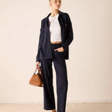 Women's travel-friendly navy heavy jersey wide-leg pants.