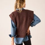 Chocolate brown knit sweater vest with a relaxed fit and a textured weave, shown from the back view.