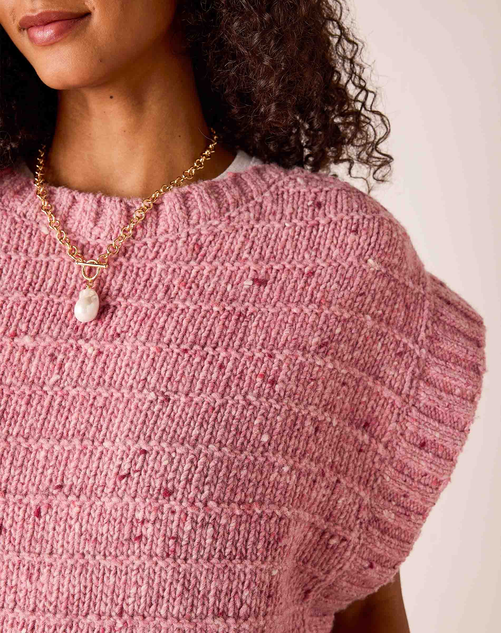 Rose pink ribbed knit sweater vest
