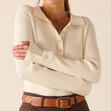 Creme ribbed knit long sleeve polo.