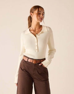 Creme ribbed long-sleeved polo top with button detail.