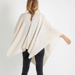 rear view of woman wearing mersea luxy wrap in cream