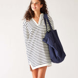 woman with mersea oversized canvas tote in navy blue over left shoulder