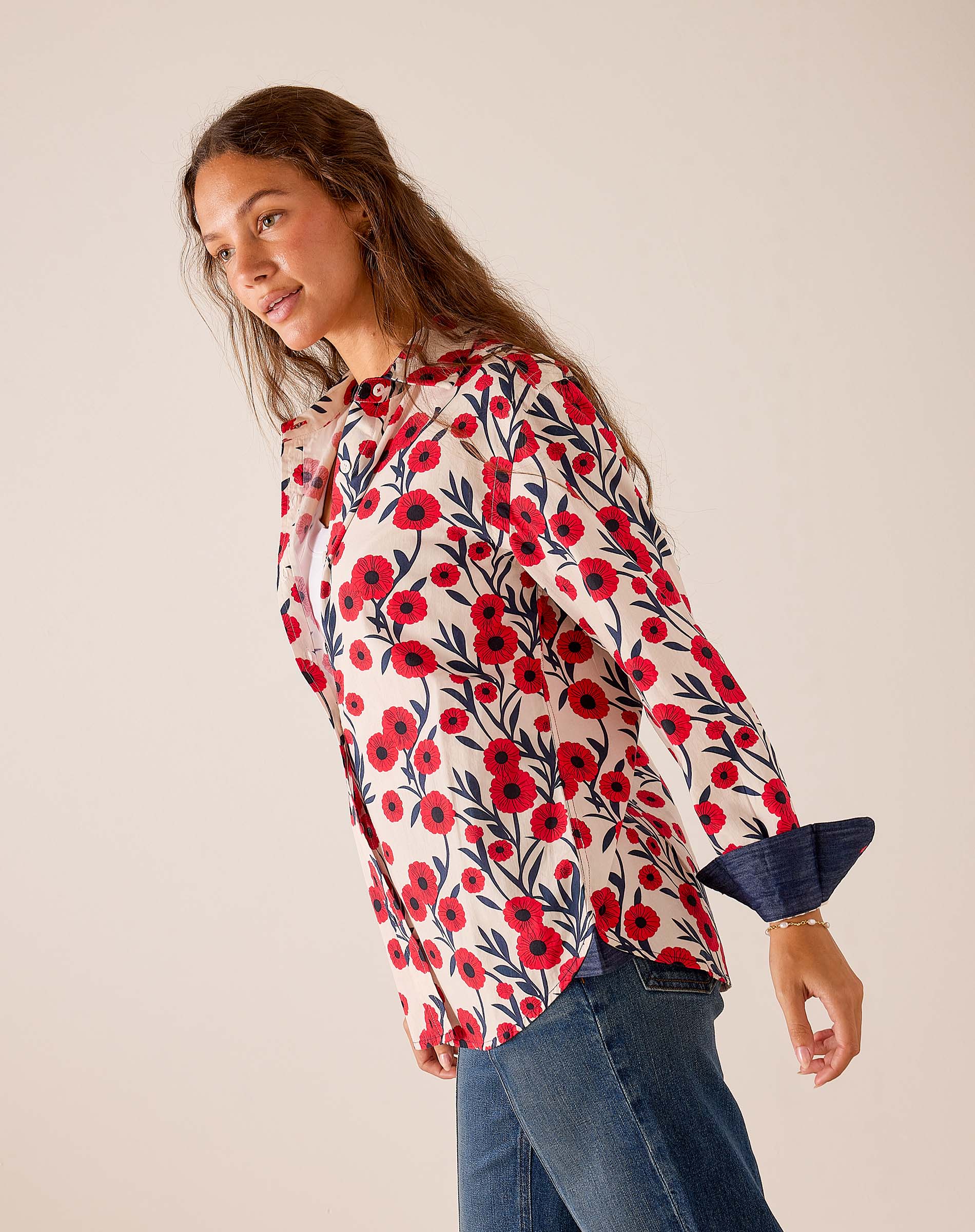 Red and navy poppy floral print button-up shirt with long sleeves and a relaxed fit.