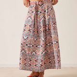 Mariano skirt with a multi-arched floral print in white, blue, and red tones.