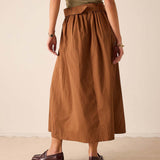 Saddle brown A-line skirt with a pleated waist and wide hem.