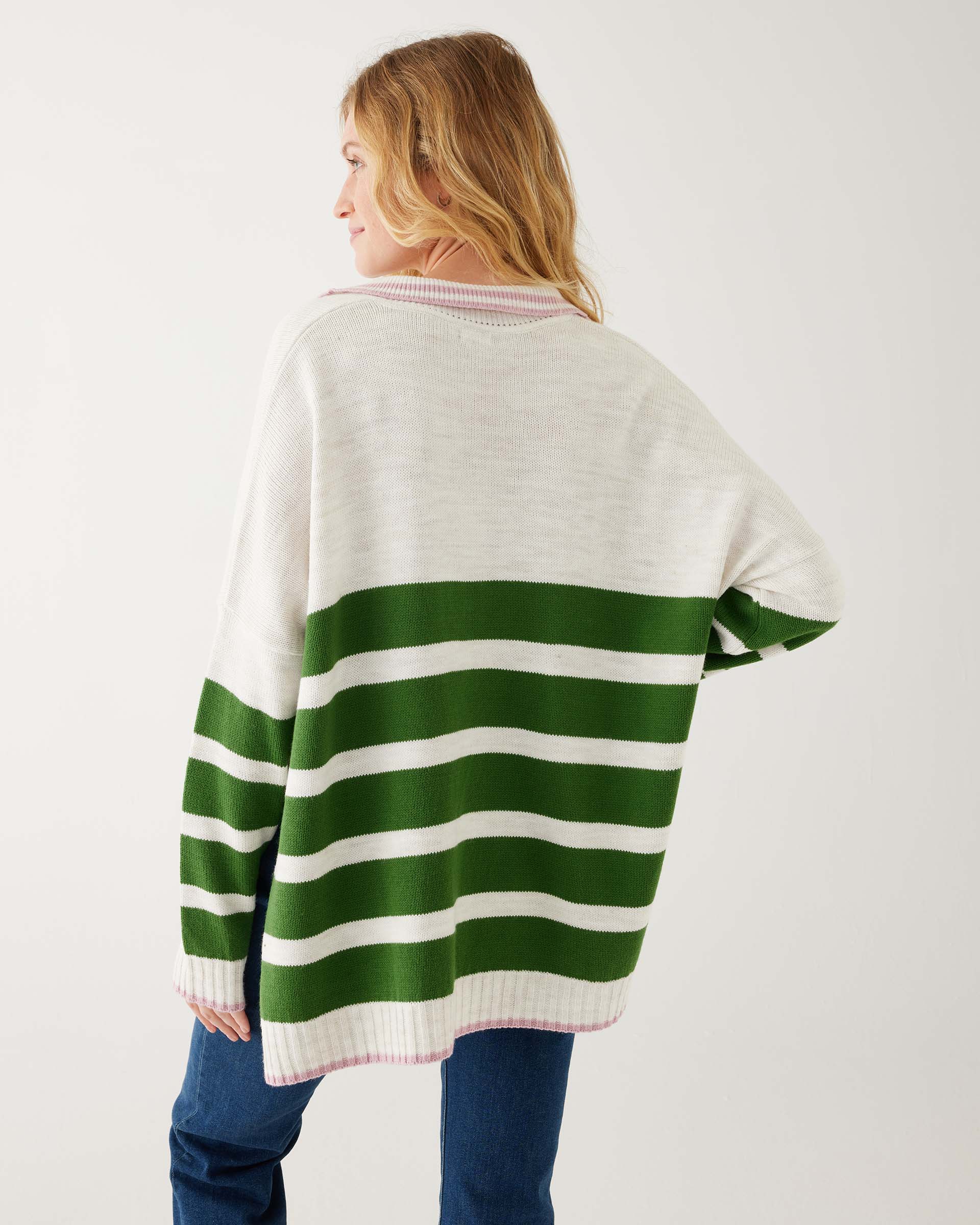 rearview of woman showcasing mersea marina polo sweater in green and sea salt stripe