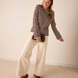 Women's travel-friendly espresso and creme striped long sleeve tee with a relaxed fit.