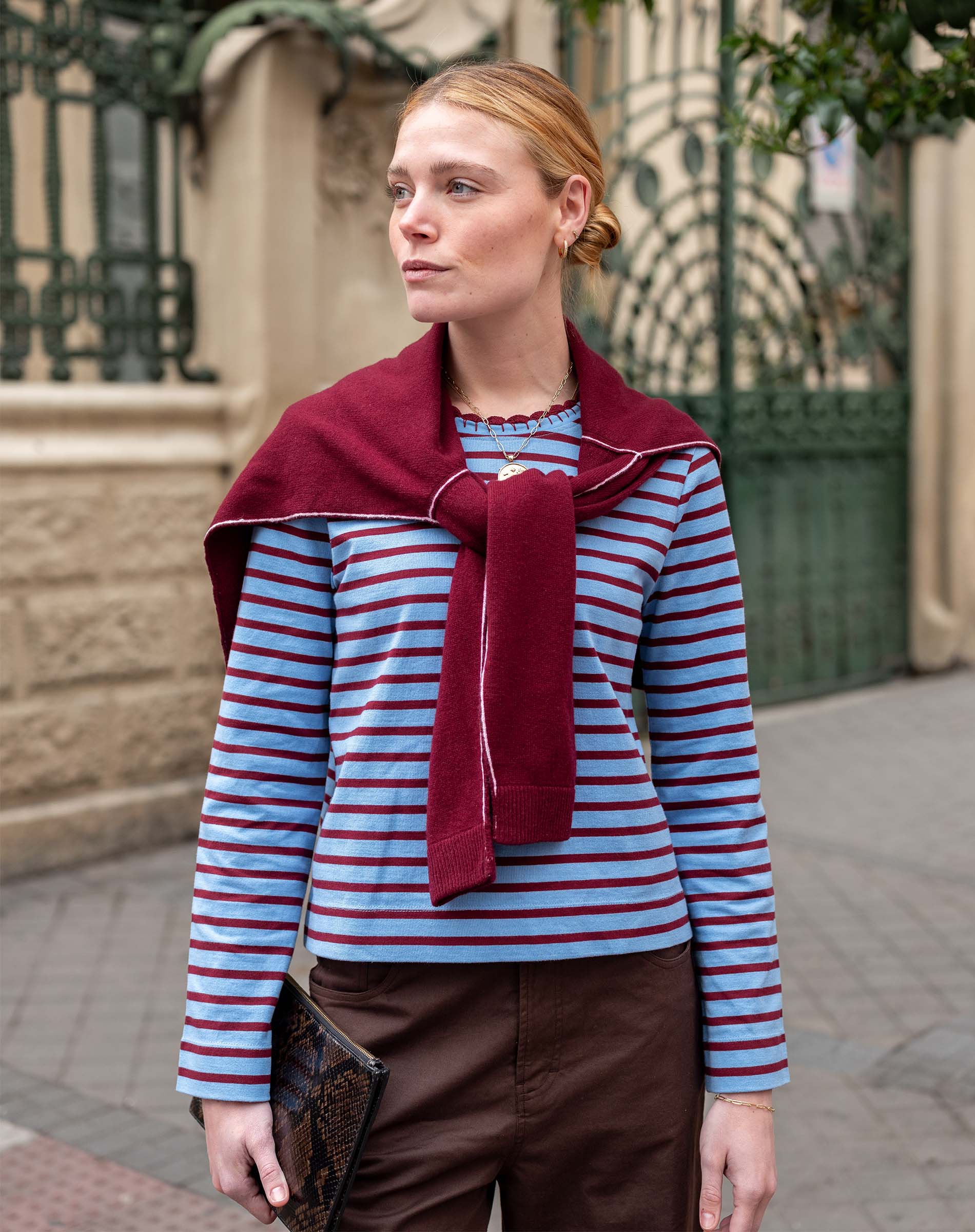 Striped tee in plum berry and blue hues.