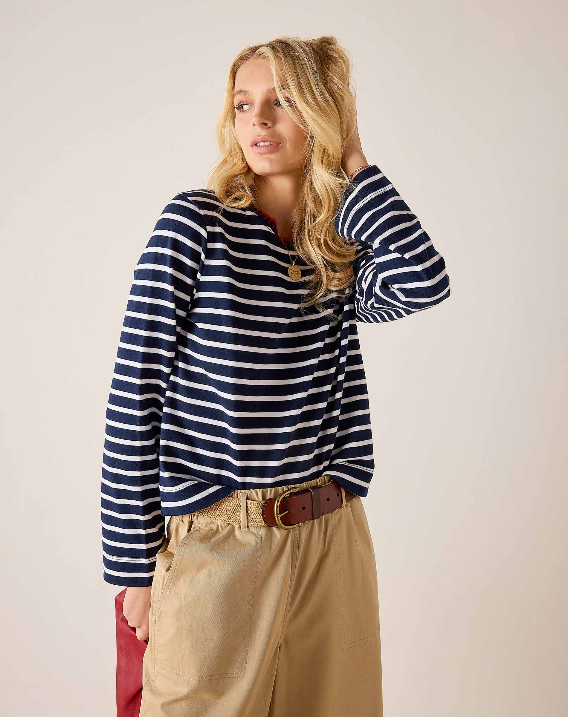 Navy and white striped crewneck tee with long sleeves.